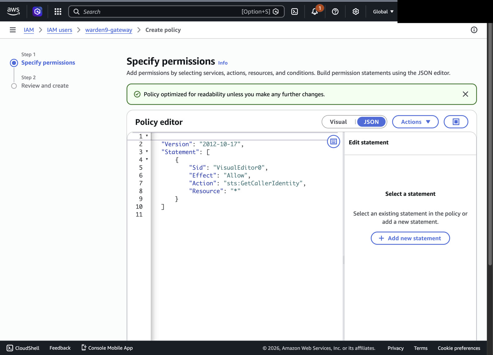 The IAM JSON policy editor granting sts:GetCallerIdentity