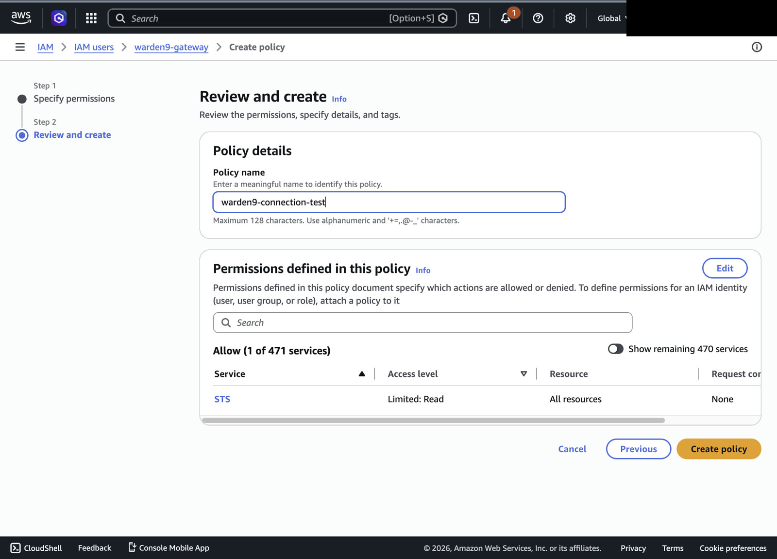 Reviewing the warden9-connection-test policy showing a single STS read permission